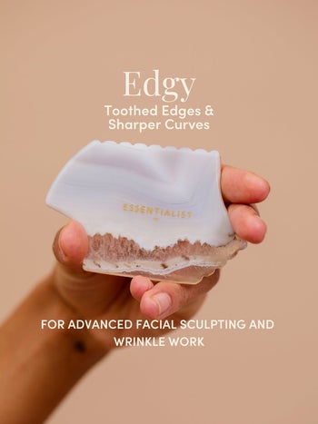 a hand holding the edgy tool