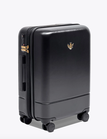 the outside of the suitcase with wheels and zippers with locks