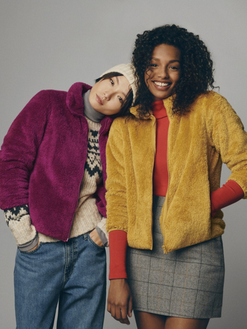 two models in pink and yellow jackets
