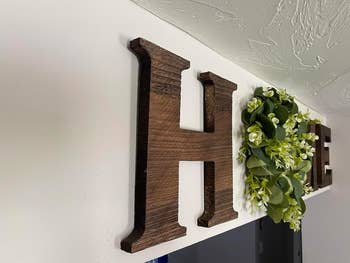 close up of letter h and artificial wreath