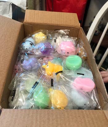 individually wrapped silicone squish toys in a box 