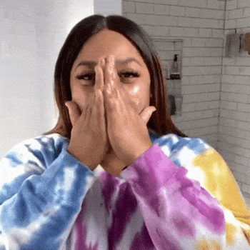 gif of model rubbing the moisturizer onto their face