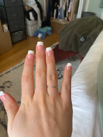 Amazon reviewer wearing french tip nails