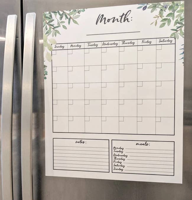 the magnetic calendar on the front of a fridge 