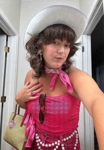 a reviewer in hot pink