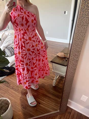 image of reviewer wearing the floral red dress