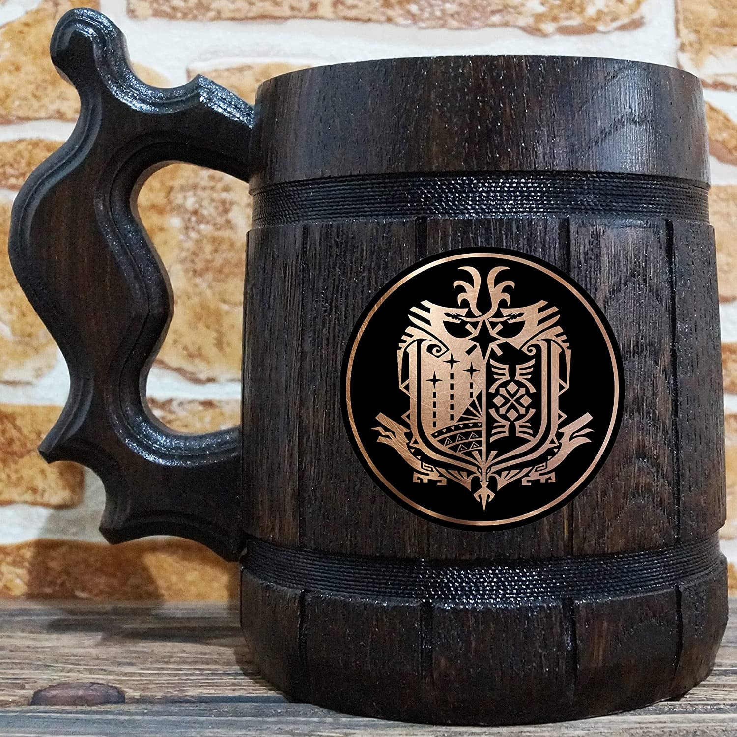  a wooden tankard with a metallic 