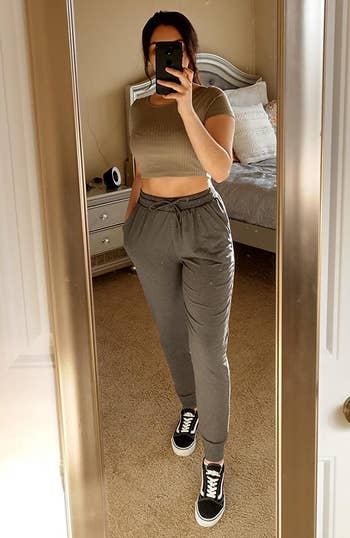 Image of reviewer wearing gray joggers