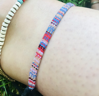 Reviewer wearing the multi-colored anklet