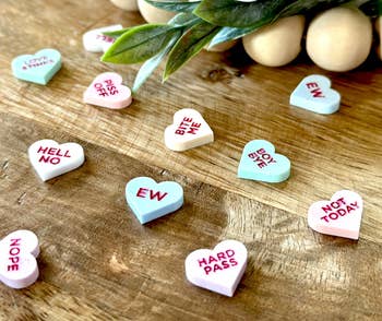 Conversation hearts that say things like: Ew, hard pass, not today, nope, hell no, boy bye, bite me, piss off
