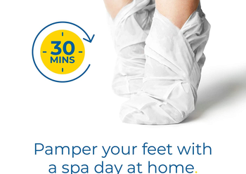 Model wearing Dr. Scholl's foot mask socks