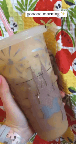 gif of buzzfeed editor holding cup of iced coffee captioned 