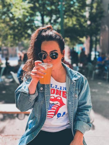 reviewer wearing oversized denim jacket