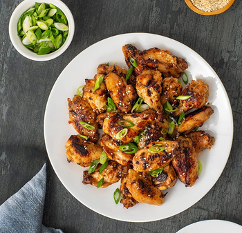 overhead shot of a plate of chicken wings cooked in the instant pot