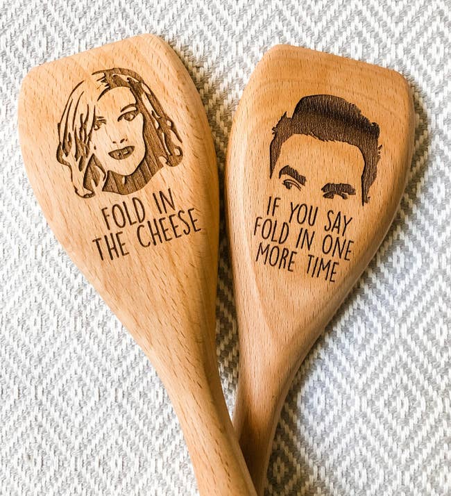 image of etched wooden spoons with moira and david on them saying 