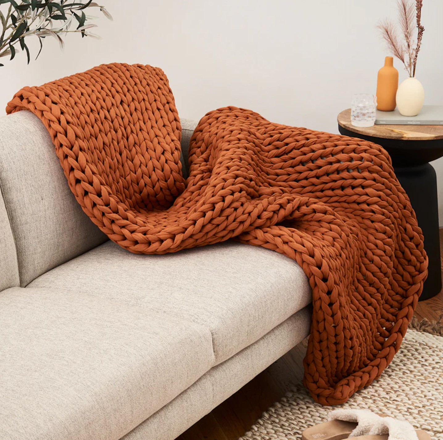 Wide knit blanket on sofa 