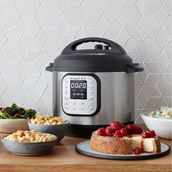 the Instant Pot surrounded by various foods on plates