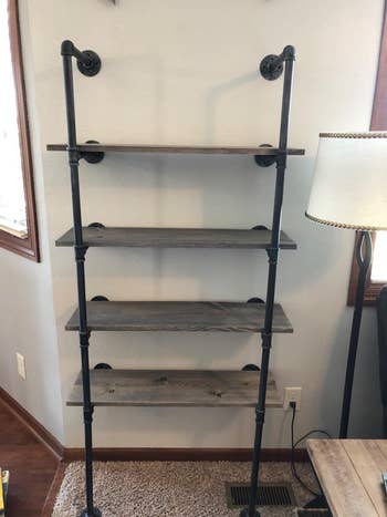 a reviewer shows empty pipe shelves
