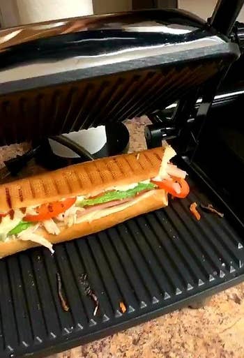 Reviewer image of sandwich in black panini press