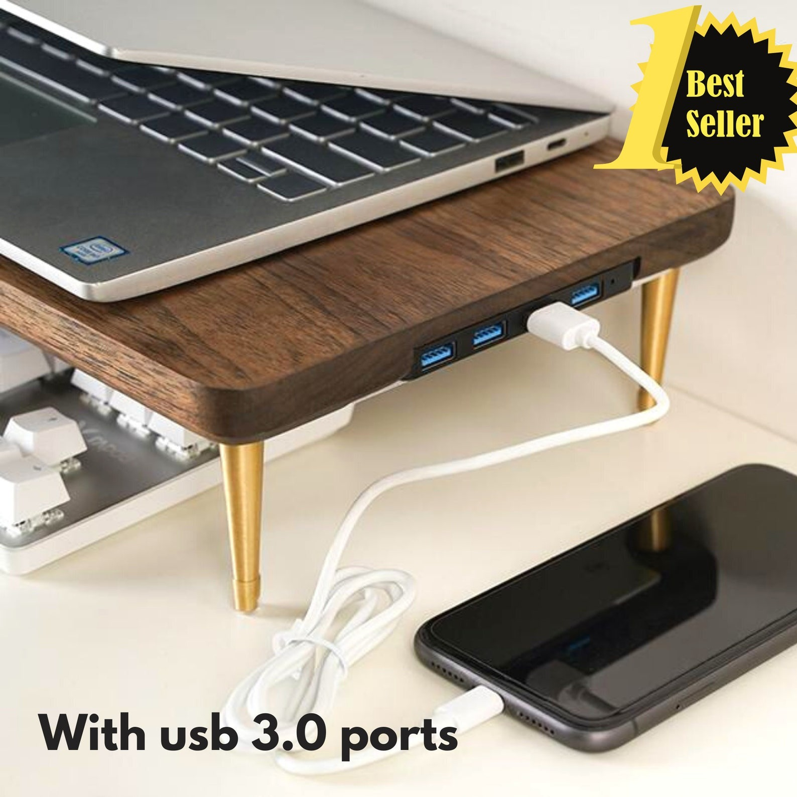 a close up of the usb ports on the dark wood riser