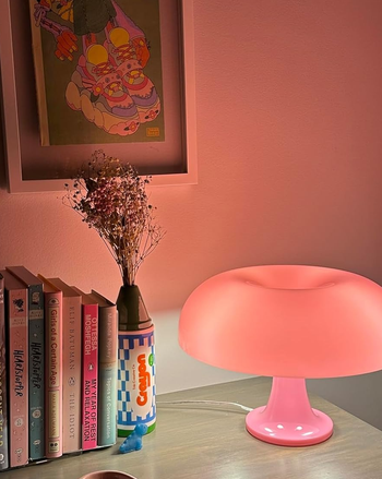 pink mushroom lamp on a dresser