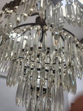 Close-up of a dirty crystal chandelier