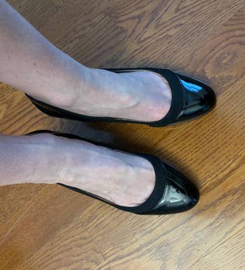 reviewer wearing the patent shoes