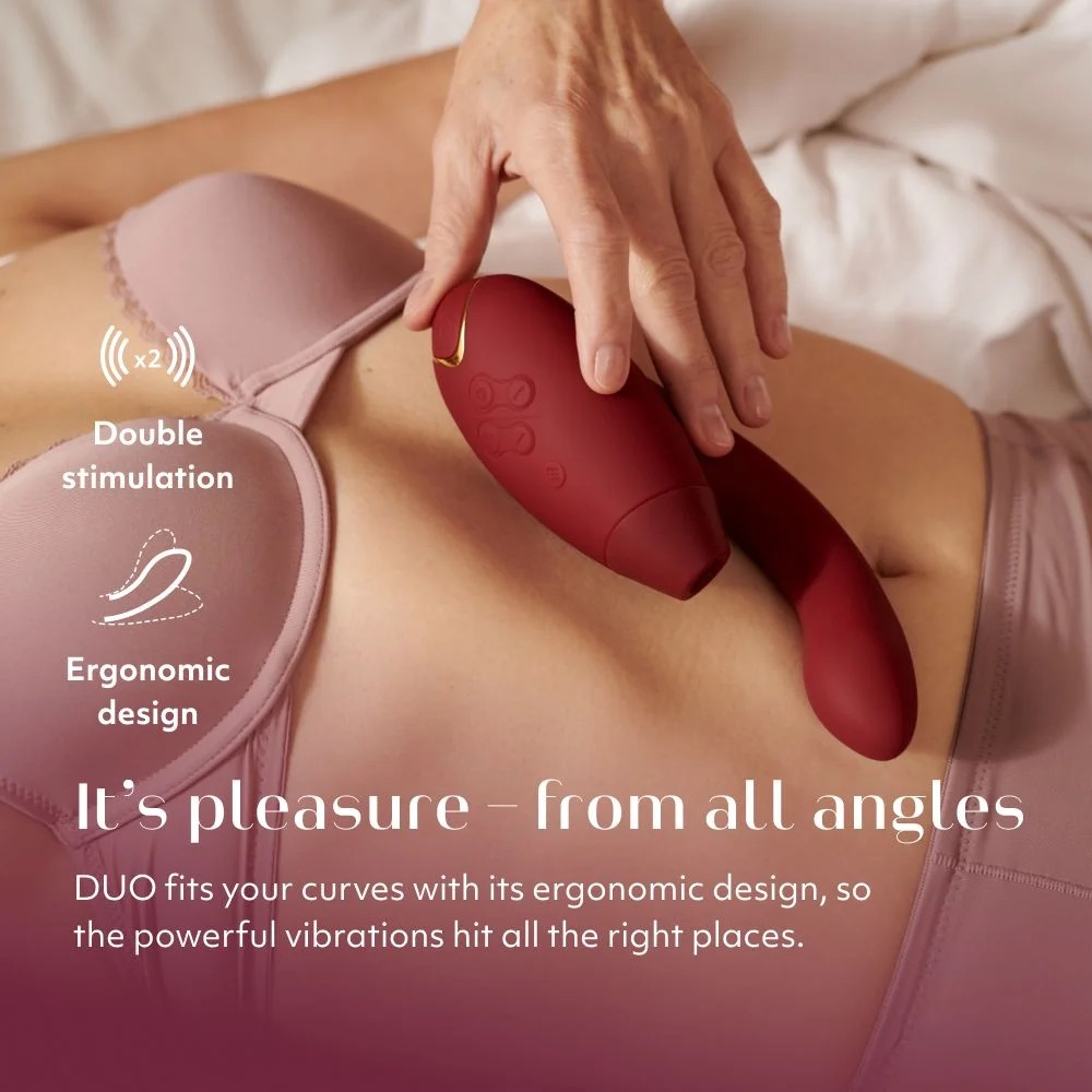 Person lying down   holds a reddish  ergonomic vibrator against their chest. Text highlights features similar  treble  stimulation and design