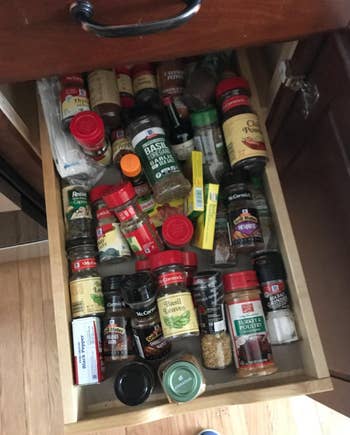 reviewer before photos of spices looking messy in a drawer