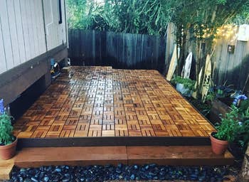another reviewer's outdoor space compete with the teak tiles