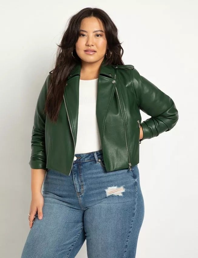 model wearing the jacket in a dark green shade called 