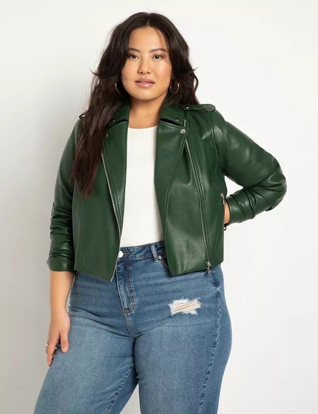 model wearing the jacket in a dark green shade called