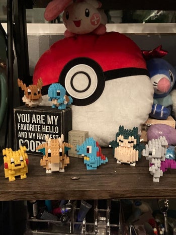 several of the pokemon nanoblocks on a shelf