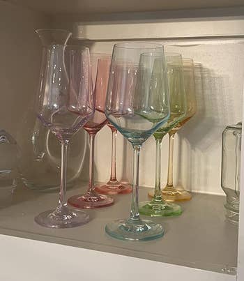 reviewer photo of the glasses in a cabinet