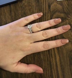 Brown press-on nails on Heather's hand