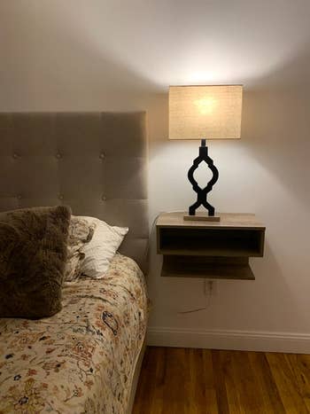 reviewer photo of lamp on floating nightstand 