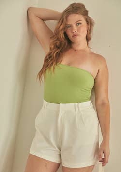 different model wearing the top in green