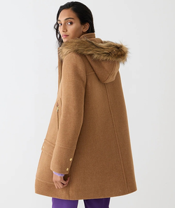 A model wearing the coat in acorn brown