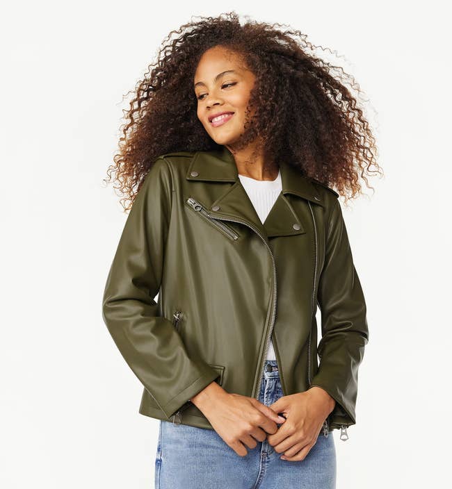 model wearing olive green-colored leather jacket