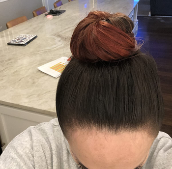 reviewer image of a top bun made with corkscrew pins