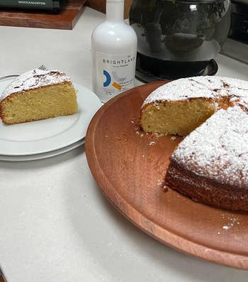 the Alive olive oil next to an olive oil cake