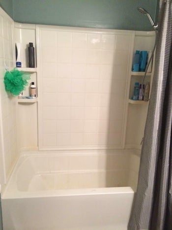 same reviewer's shower without orange rust stains after using the Iron Out spray