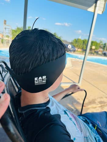 Reviewer's teen wearing a achromatic swimming headband