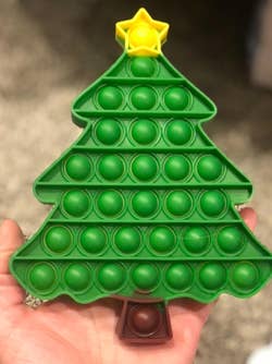 reviewers Christmas tree shaped pop-it toy