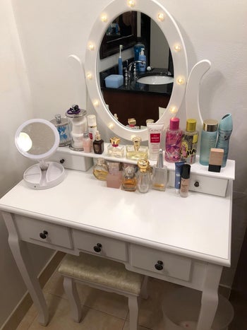 same reviewer's photo, of vanity lit up