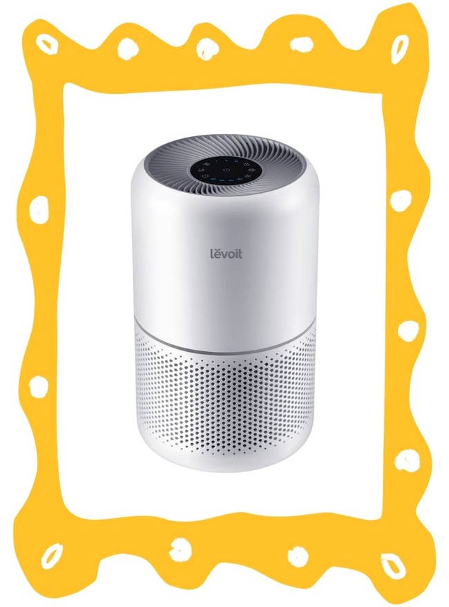 Levoit air purifier with a cylindrical design and digital top display