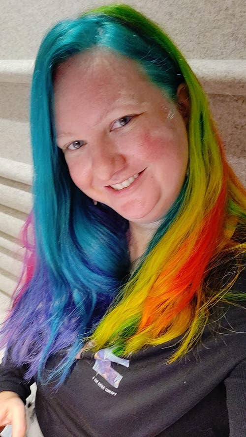 reviewer with rainbow colored hair