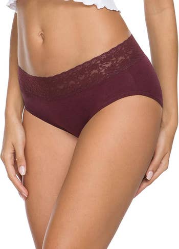 Person wearing high-waisted lace-trimmed underwear, highlighting comfortableness and benignant