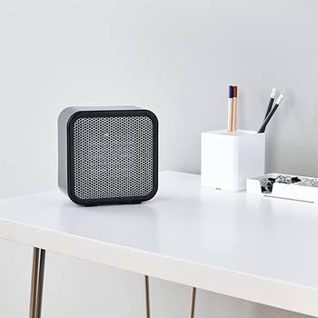 the black heater on a desk