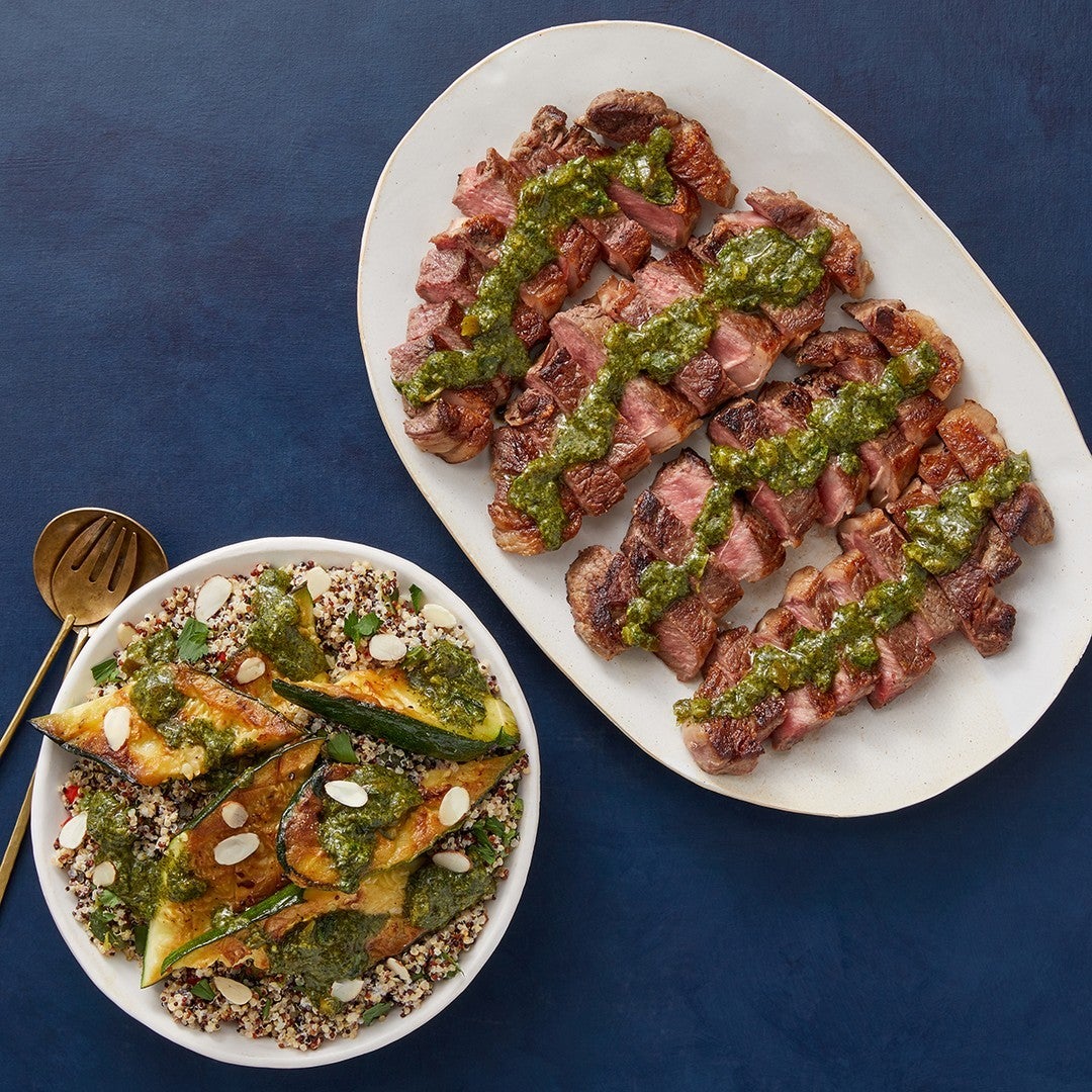Chimichurri Strip Steaks with Roasted Zucchini and Poblano Quinoa